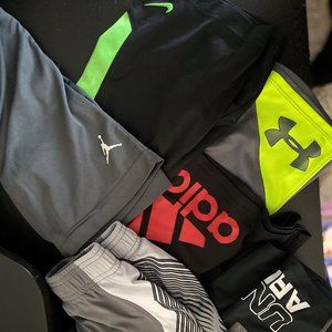 6 PAIRS OF BOY SHORTS. SIZE 6. UA, NIKE, ADIDAS
